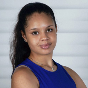 An informal portrait of young researcher, she is smiling at the camera